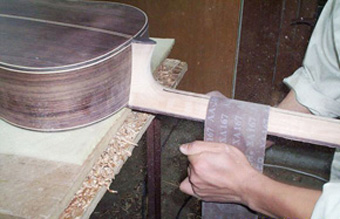 Hand Sanding the Neck.